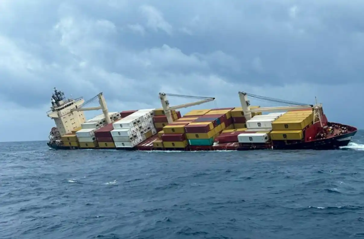 Hazard alert as containers from sunken Liberian cargo ship wash ashore in Kerala